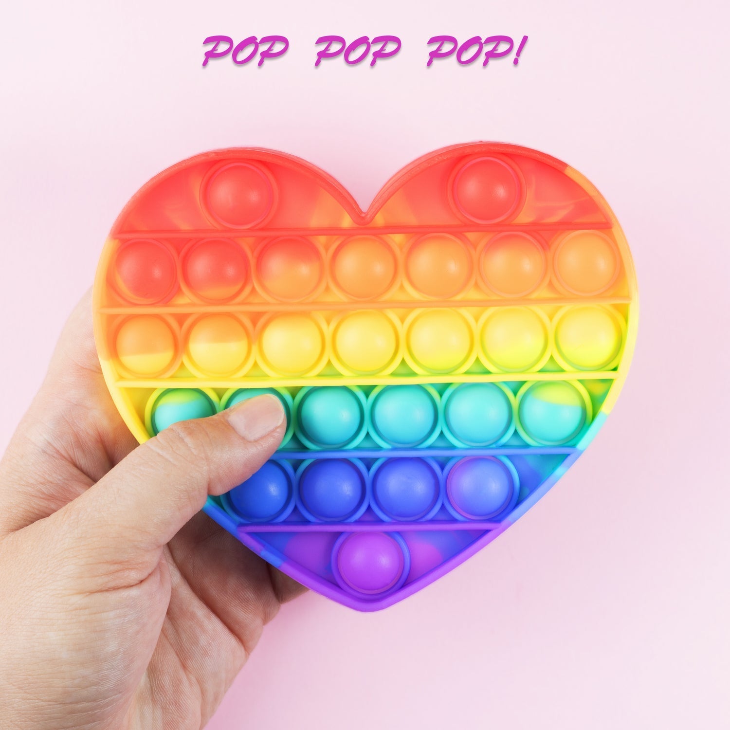 Heart pop it sensory toy with colorful bubbles.